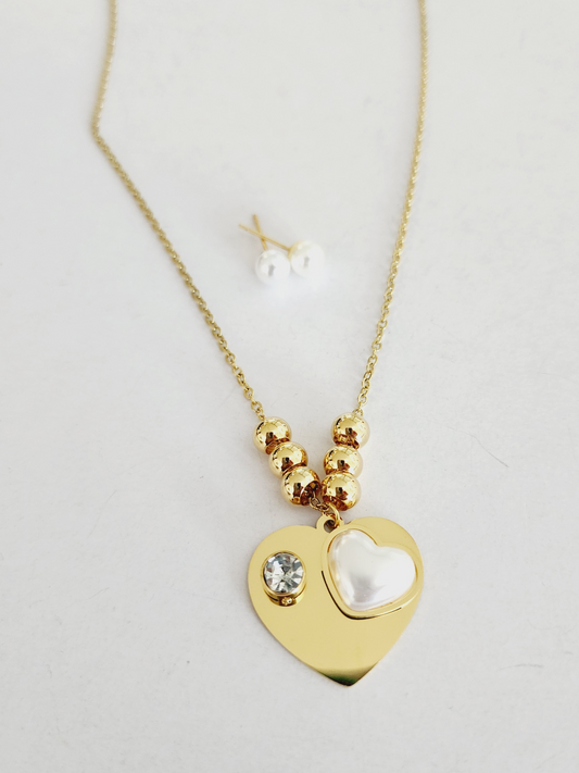 Set of earrings and chain with a golden heart